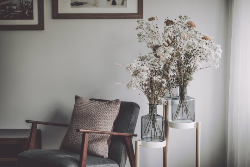 Ductless Mini Splits for Comfortable and Healthy Living. Flower arrangement on an end table.